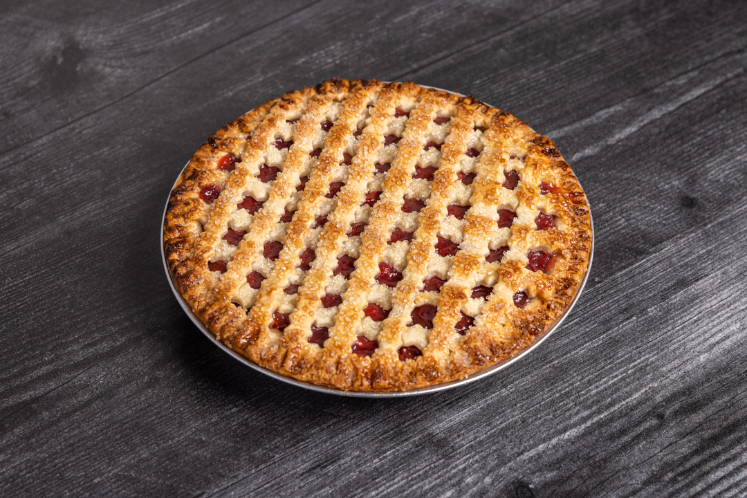 A picture of a Strawberry Pie sitting on a table.